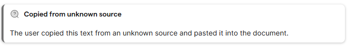 Authorship notification in a grey pop up box indicating text has been copied from an unknown source, there is a grey magnifying glass icon and the notification reads "The user copied this text from an unknown source and pasted it into the document'. 